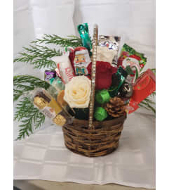 Santa Wishes. An arrangement by Jane's Floral Dreams.