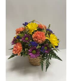 Garden Blooms Basket Arrangement. An arrangement by Balloon Bouquets Plus.