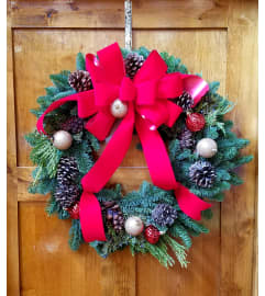 Jenny's Floral Christmas Wreath. An arrangement by Petals and Pages.