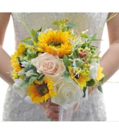 Sunflowers Bride Bouquet. An arrangement by Geni's Florist and Gifts.