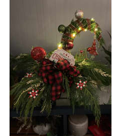 Whooville Grinch Trees. An arrangement by Love and Grace Floral and Events.