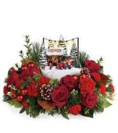 casita xmas. An arrangement by Spring Branch Florist.