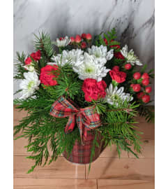 The Christmas Hug. An arrangement by Maezy's Petals.