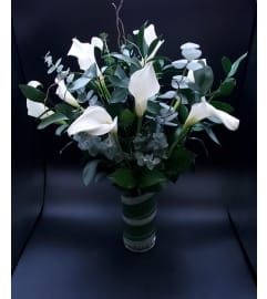 Adoring Calla White Bouquet. An arrangement by Hours of Flowers.
