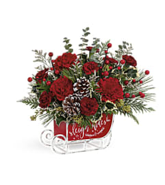 Vintage Sleigh Floral. An arrangement by Blue Ridge Flowers. Vintage Sleigh Floral. An arrangement by Blue Ridge Flowers.