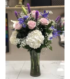 Elegance In The Air. An arrangement by Flower World and Gifts.