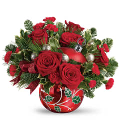 Deck The Holly (Teleflora). An arrangement by Sueppel's Flowers. Deck The Holly (Teleflora). An arrangement by Sueppel's Flowers.