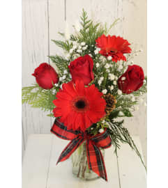 Christmas Sleigh Bells Bouquet. An arrangement by Avenida Flowers. Christmas Sleigh Bells Bouquet. An arrangement by Avenida Flowers.