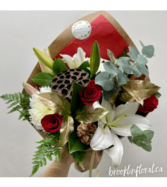 Magnolia Holiday Bouquet. An arrangement by Brooklin Floral and Garden Shoppe Inc.. Magnolia Holiday Bouquet. An arrangement by Brooklin Floral and Garden Shoppe Inc..