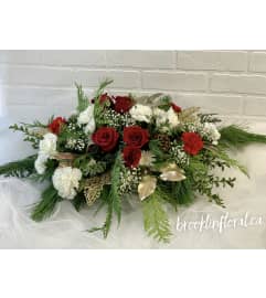 The Most Wonderful Time Centrepiece. An arrangement by Brooklin Floral and Garden Shoppe Inc.. The Most Wonderful Time Centrepiece. An arrangement by Brooklin Floral and Garden Shoppe Inc..