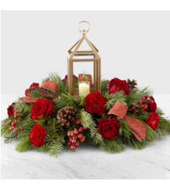 I'll be Home for Christmas Centerpiece Arrangement. An arrangement by Bee Flowers.