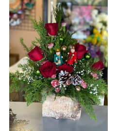 Warm Christmas Love. An arrangement by Flamingo Floral and Gifts.