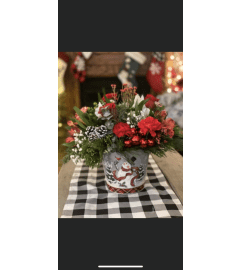 Snowman Christmas Tin kelly anns. An arrangement by Kelly Ann's Floral.