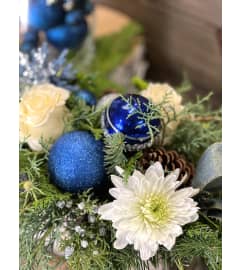 Blue Hues Holiday Centerpiece. An arrangement by Donato's Floral. Blue Hues Holiday Centerpiece. An arrangement by Donato's Floral.
