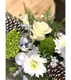 Sliver Hues Holiday Centerpiece. An arrangement by Donato's Floral. Sliver Hues Holiday Centerpiece. An arrangement by Donato's Floral.