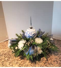 Blue Christmas Centerpiece. An arrangement by Zaisers Florist and Greenhouse.