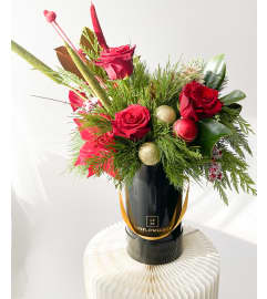Mister Claus. An arrangement by Lux Flower Box.