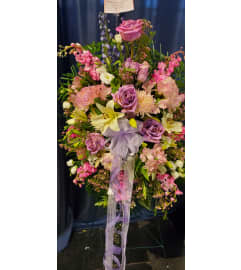 Field of Flowers Easel Spray. An arrangement by Now and Forever Flower Boutique.