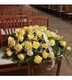 Remembrance Of Casket Spray. An arrangement by Now and Forever Flower Boutique.