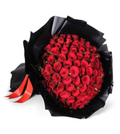 Black Wrapped Roses. An arrangement by Rose Flowers. Black Wrapped Roses. An arrangement by Rose Flowers.