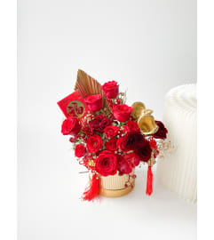 Lunar New Year Lucky Box. An arrangement by Lux Flower Box.