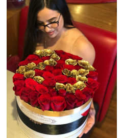Red and Gold Birthday Box Roses. An arrangement by Rose Flowers.