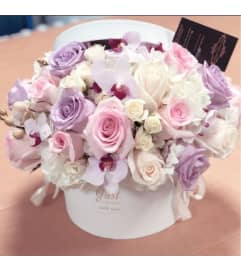 Pastel Box. An arrangement by Rose Flowers.