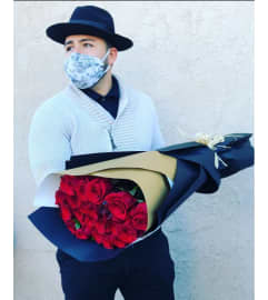 Wrapped Rose Mini. An arrangement by Rose Flowers.