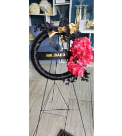 NameMe Wreath507. An arrangement by Now and Forever Flower Boutique.