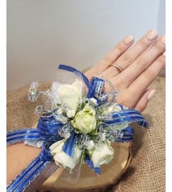Royaly Yours Corsage. An arrangement by Zaisers Florist and Greenhouse.