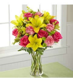 cheery pinks and yellows :). An arrangement by Dupree's Root 88 Garden Center and Florist.