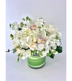 The Pure Perfection. An arrangement by Hillcrest Florist.
