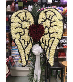 Angel Wings With Red Heart. An arrangement by Elegant Florist.