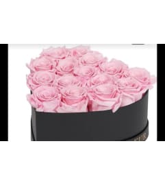 pink box heart. An arrangement by Butterflies Flower Shop.