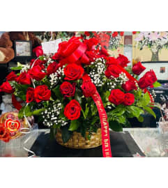 Red Roses Basket. An arrangement by Geni's Florist and Gifts.