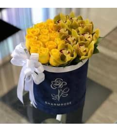 TWENTY FOUR SIGHS OF LOVE. An arrangement by Butterflies Flower Shop.