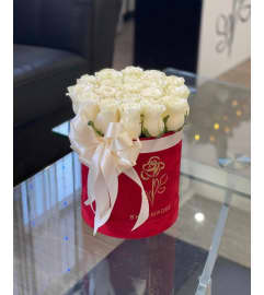 purity of love. An arrangement by Butterflies Flower Shop.