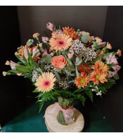 Peach Parade. An arrangement by Pandora's Posies.
