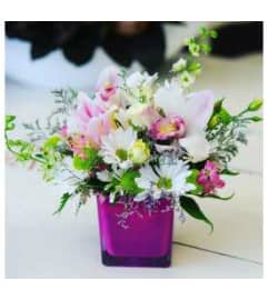 Delicate and Delightful. An arrangement by Avenue Florist.