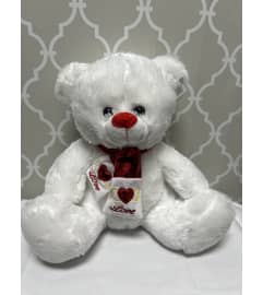 White love teddy bear. An arrangement by Shalimar Flower Shop.