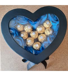 My Blue Heart Box. An arrangement by Silvia's Party Supplies and Floral.