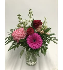Valentines mason jar. An arrangement by DMP Flowers and Gifts.