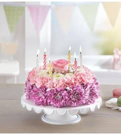 Birthday Wishes Flower Cake Pastel 2022. An arrangement by Royal Louis Florist.