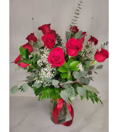 The Classic Dozen Arranged. An arrangement by The Garden Gate Gifts and Florals.