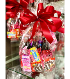 Candy Six Pack. An arrangement by Morgan Florist.