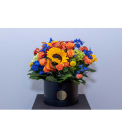 Radiant Day Bouquet. An arrangement by Viva's Flower Shop.