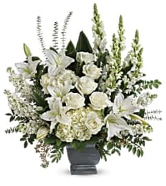 Horizon Arrangement. An arrangement by Jennifer's Flowers and Gifts.