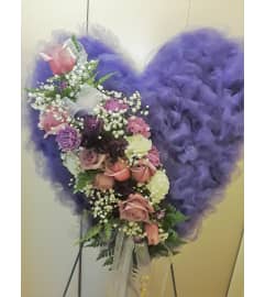 Flowers and Tulle Closed Heart Easel. An arrangement by Now and Forever Flower Boutique.