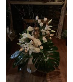 Royal Bronze Urn Spray. An arrangement by Silver Rose Emotions.