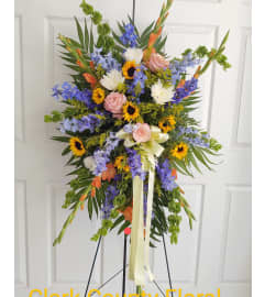 Sunflower Charm Standing Spray. An arrangement by Clark County Floral.